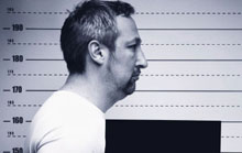 Profile of a man in a police lineup.