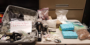 Example of law enforcement seizure of opioid drugs and paraphernalia