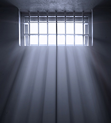 Light shining through jail cell window.