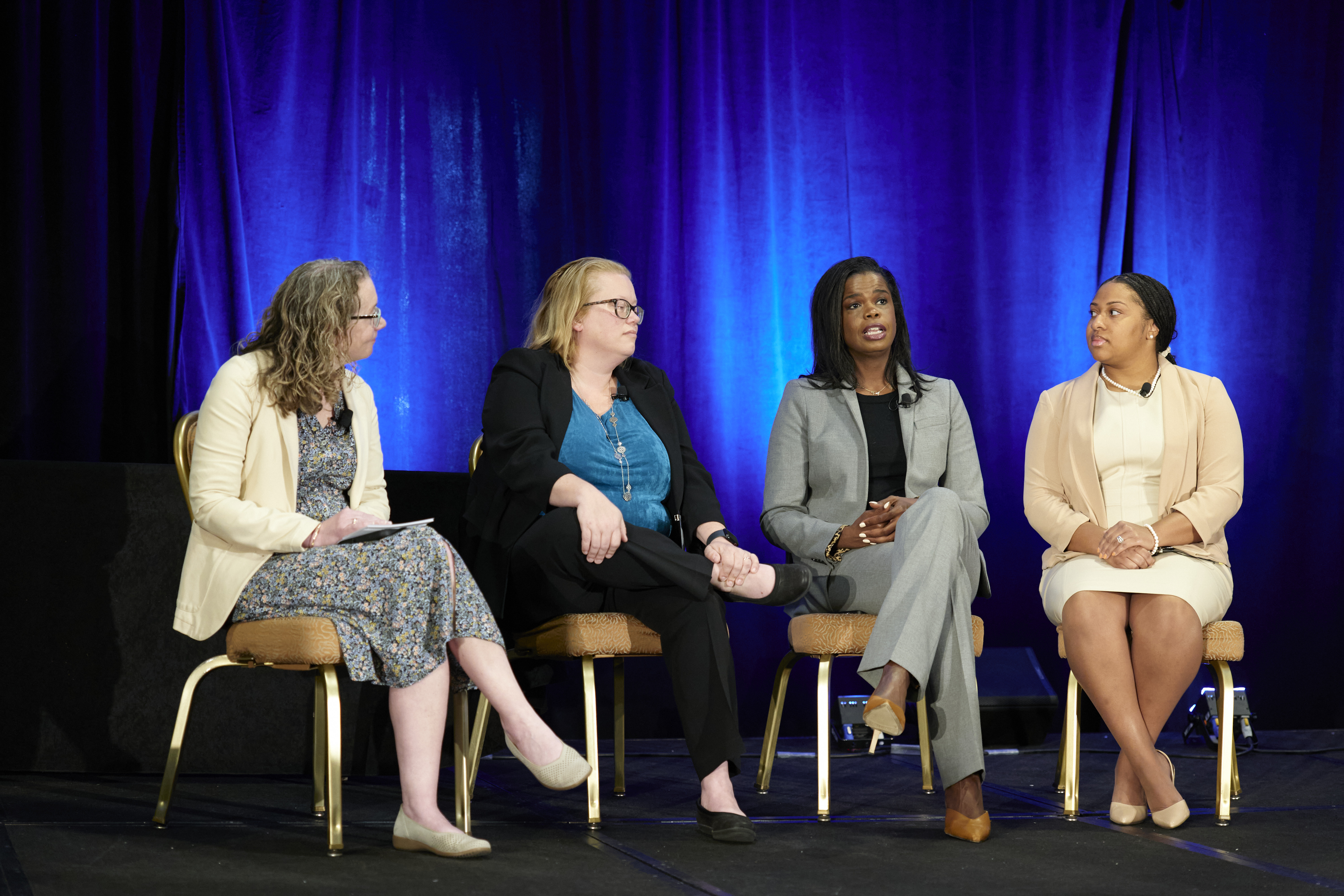 NIJ 2023 Research Conference plenary "Can Science Enhance Equity? Findings and Implications From a Study To Detect Bruising on Victims with Dark Skin Pigmentation" participants Carrie Johnson, Dr. Katherine Scafide, Kimberly Foxx, and Chantel Hammond