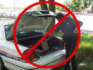 Image of police officer putting evidence in the truck of a police car, overlaid with a red do not do symbol