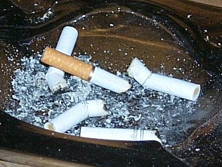 Image of cigarettes in ashtray