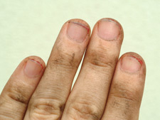 Closeup photo dirty fingertips