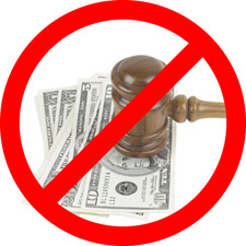 photo of a judge's gavel on top of money with a red circle with a diagonal cross through it on top