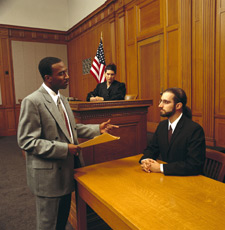 Photo inside of a courtroom where an expert is being interviewed