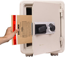 Image of a hand placing evidence into a safe