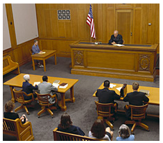 Photo of courtroom during criminal proceedings