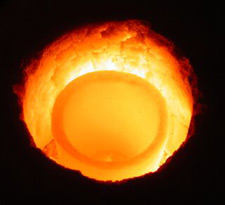 photo of melting crucible with molten gold