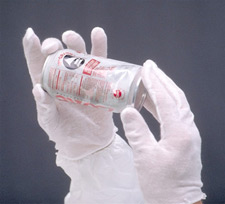 Personal protective equipment, pair of gloved hands holding a soda can