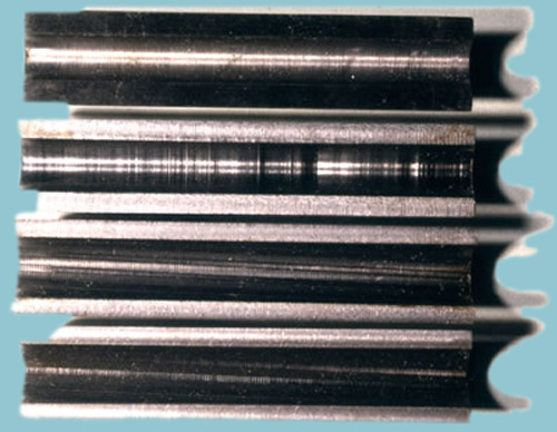 Sectioned barrels, top to bottom: reamed, drilled, button rifled, broached