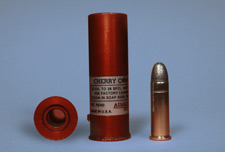 Adaptor for shotgun to fire rifle and handgun ammunition
