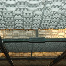 Sound abatement system on a firing range ceiling