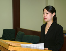 Photo of a woman giving testimony