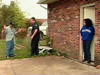 Photo of Officer Patrick questioning Priscilla Ortiz