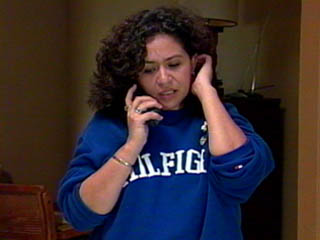Photo of woman making a call to 911