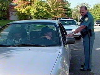 Photo of Officer Burns stopping a vehicle at the corner of 5th and Clark for failure to stop at a stop sign.