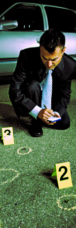 image of a detective making notes at a crime scene