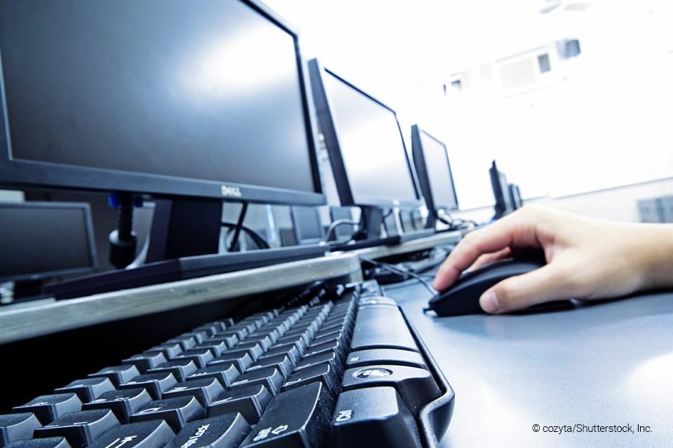 someone at a computer typing