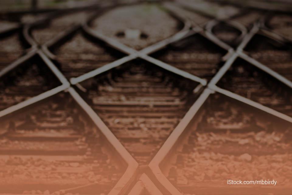 picture of a cross road of a railroad track