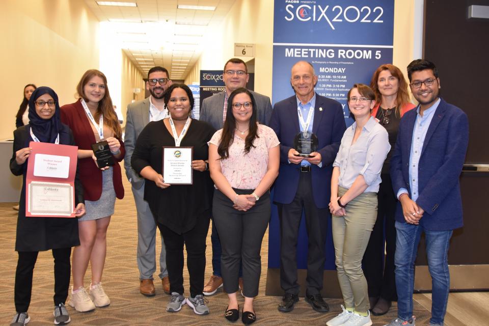 NIJ grantee Dr. Lednev and current and former students at SCIX 2022
