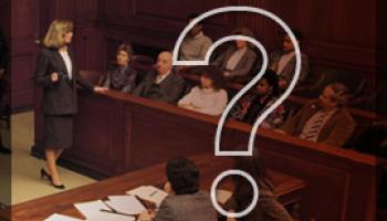 Photo of a DNA Analyst educating a jury in a courtroom