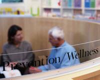 prevention-wellness-200X160.jpg Older man discussing health and wellness issues with a medical professional