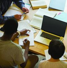 160937456 Two students working on a paper