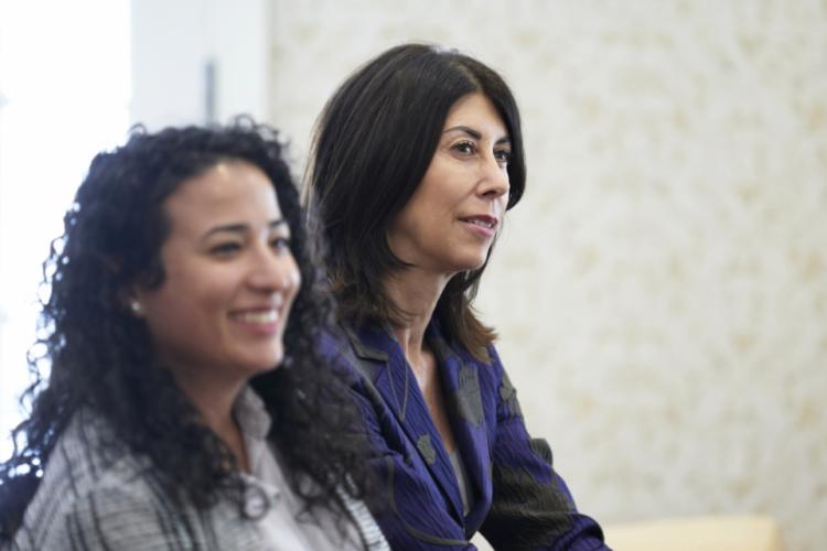 NIJ Director Nancy La Vigne and Policy Advisor Alexandra Montero take in a panel at the NIJ 2023 Research Conference
