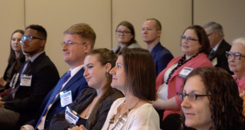  Attendees listen to a panel at the NIJ Research Conference