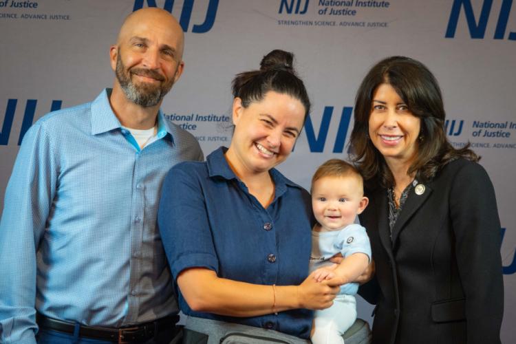 NIJ Director Nancy La Vigne takes selfies with conference attendees