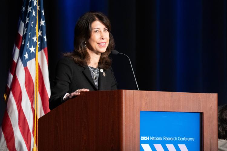 NIJ Director Nancy La Vigne makes remarks to conference attendees
