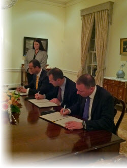 Danielle Weiss, forensic scientist, NIJ; Tjark Tjin-a-Tsoi, CEO, Netherlands Forensic Institute; Dr. John H. Laub, Director, NIJ; Dr. Louis B.J. Vertegaal, Director of Chemical and Physical Sciences Division at the Netherlands Organisation for Scientific Research.